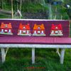 coussins sur le banc