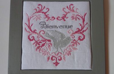 Finition de la broderie oiseau/coeur.