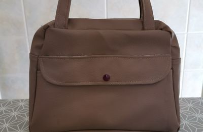 le sac à langer réduit en trousse de toilette