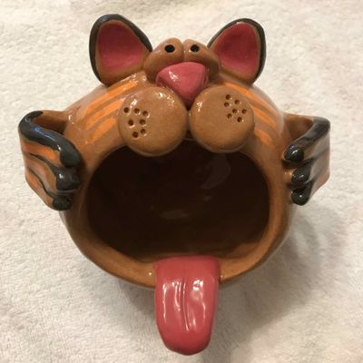 Suspension mangeoire chat