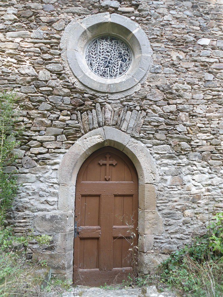 Saint-Cyrice le Truel porte entrée et rosace