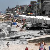 D-Day battle images merged with photos of tourists on the same spots