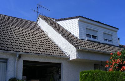 Rebelotte pour une autre toiture émaillée sur tuiles béton