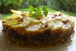 parmentier de potiron aux noisettes,effiloché de canard confit,écailles de pommes-de-terre