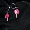 boucles d'oreilles sucettes roses