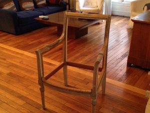 Fauteuil en bois mouluré et sculpté style Directoire