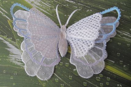un magnifique papillon en pergamano