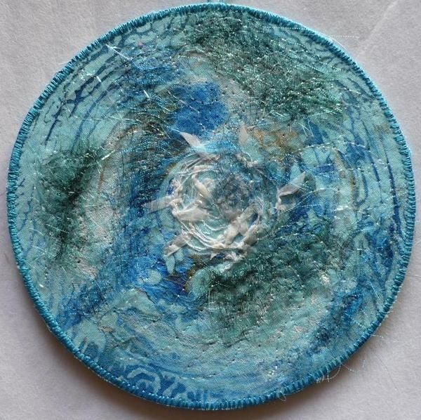 récup de CD pour une déco textile