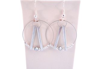 boucles d'oreilles tipis métal