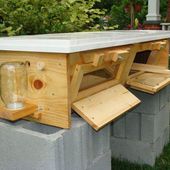 Hand made top bar beehive for bee conservation, education, pollination, honey extraction.