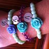 Pulseras de cuentas con rosa