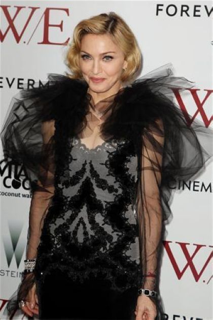 Hosted by the Weinstein Company and The Cinema Society, at the Ziegfield Theater in New York on January 23, 2012. Madonna wears a Marchesa dress. Marchesa designer Georgina Chapman is married to Harvey Weinstein.
