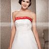 A-strapless trailing red and white color wedding