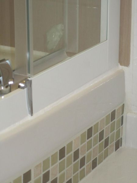 Rénovation d'une douche suite à une fuite d'eau dans une cloison