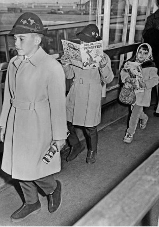 1962 December, London, Heathrow Airport - With their nanny, Liza, Maria, Christopher and Michael Jr will spend Christmas with their mother.