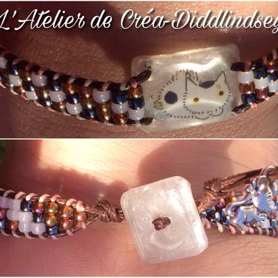 Bracelet wrap réalisé sur le wrapit rainbow loom thème chat  avec perlé et bouton en résine UV 