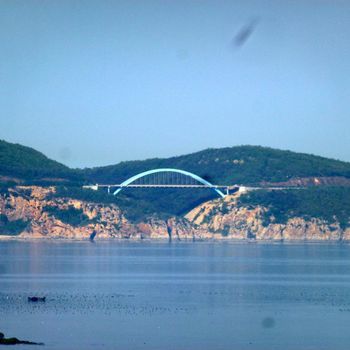 Sortie de la baie -phare - ponts entre les îles