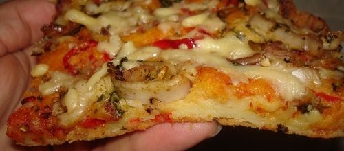 Pizza à base de pâte liquide extra-moelleuse بيتزا سائلة