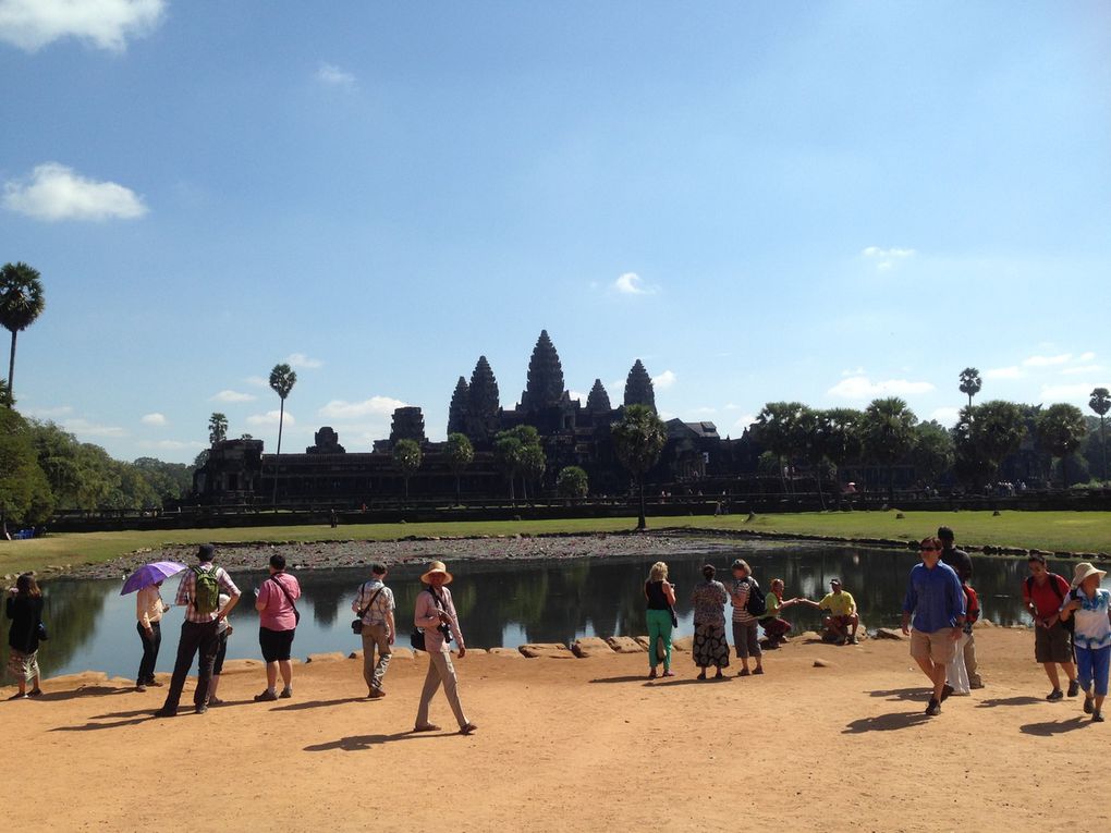 Scenes outside of Angkor Wat. The sun was beaming but tourists were enjoying Angkor at the same time.