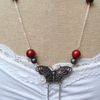 Collier papillon ciselé