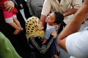 A Palestinian woman whose husband was killed by Israeli shelling