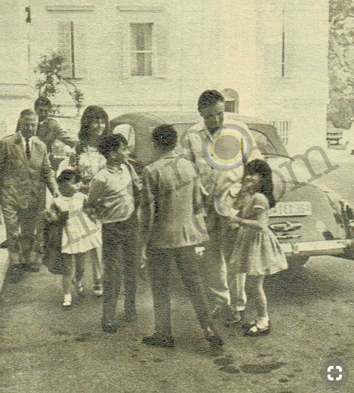 Rome or France, the Burton's family arrives at their hotel on a sunny day. Elizabeth Taylor, Richard Burton, Liza Todd Burton, Maria Burton, Christopher and Michael Jr. Wilding.