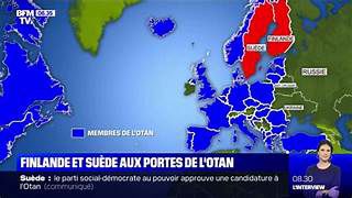 Photo 1 En rouge sur la carte les nouveaux pays adhérents à l'OTAN Photo 2 Des soldats estoniens participent à des exercices militaires avec des soldats de l'Otan français et britanniques, le 6 février 2022- soit 18 jours avant l'entrée des troupes russes en Ukraine - près de Rakvere, dans la région de Tapa  afp.com/ALAIN JOCARD