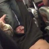 Passenger dragged off overbooked United flight