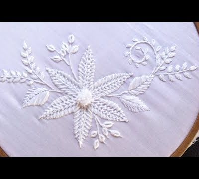 . Points de broderie à la main.