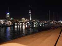 Auckland  de jour ,de nuit et le drapeau Néo-Zélandais 