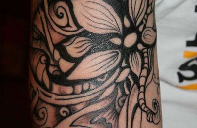 Tatouage homme fleur