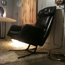 Superbe fauteuil en cuir.