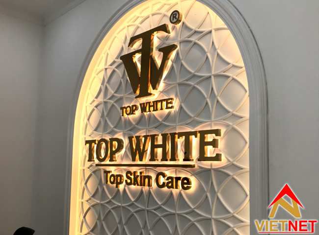 Mẫu bảng hiệu chữ inox vàng cho thương hiệu Top White