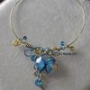 Collier papillon bleu