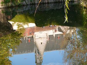 Le Pont des Jardiniers (construction ateliers Eiffel) - l'abbatiale St Jean-Baptiste- l'entrée d'une cave sous le château