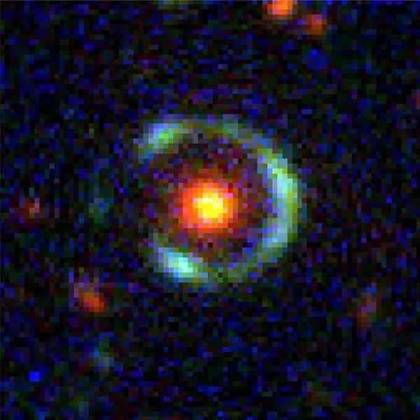 Le Fer à Cheval Cosmique: un anneau d'Einstein géant qui permet aux astronomes d'observer une galaxie dans le détail quand l'univers n'avait pas 3 milliards d'années 