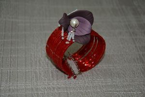 Bracciale di perline e fiore di fimo