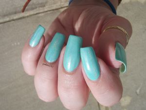 Swatch KIKO vert d'eau holographique