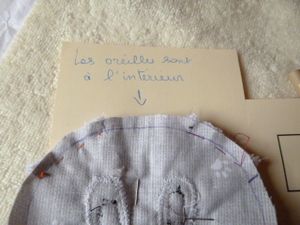 Doudou accroche-tétine à tête d'ourson