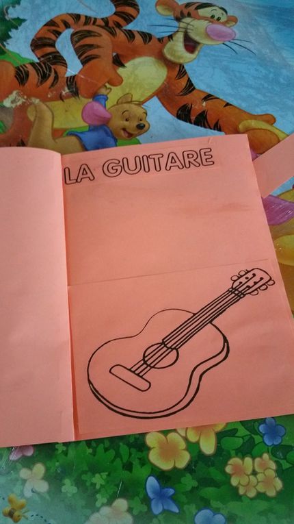 FETE DE LA MUSIQUE 2016 : fabrication d une guitare , maracasse et d un livret sur les instruments de musique