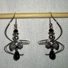 Boucles d'oreilles spirales avec breloques noeuds