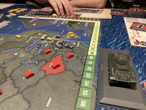 Le pion Premier Joueur, et un allemand omnipotent