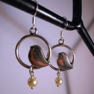 Boucles d'oreilles pie voleuse