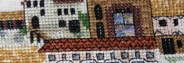 Au coeur d'un village médiéval en broderie