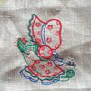 Sunbonnet tricote en broderie machine