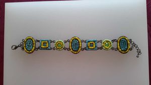 Création CarolineA: Bracelet en métal , pavé de perles de rocaille