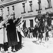 German cavalry enters the Polish city of Łódź Litzmannstadt greeted by members of the city considerable ethnic German community.jpg