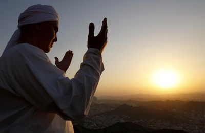 A Muslim pilgrim prays at the top of Mount Noor in Mecca 