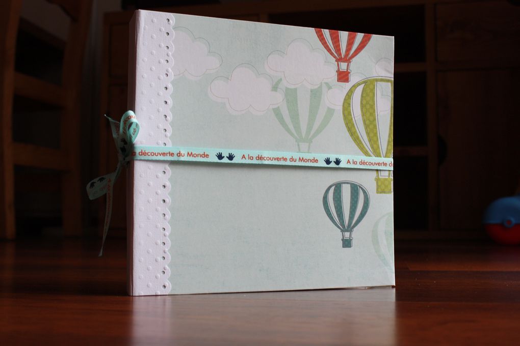 un mini album aux papiers colorés, dynamiques, approprié pour un petit garçon tonique :)