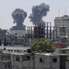 Smoke and flames are seen following what witnesses said were Israeli air strikes in Rafah